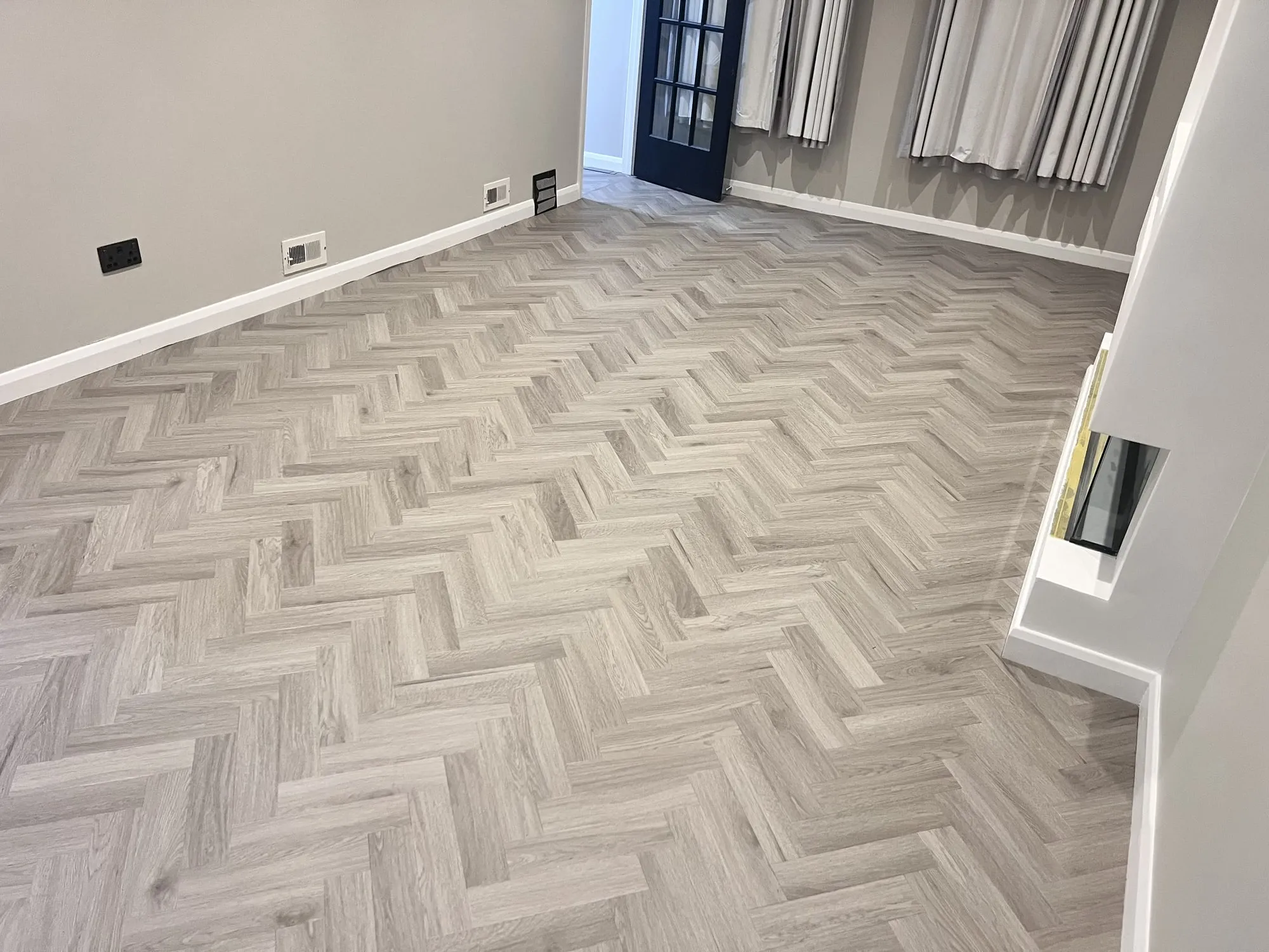 Glue-down LVT, herringbone parquet style, Reading