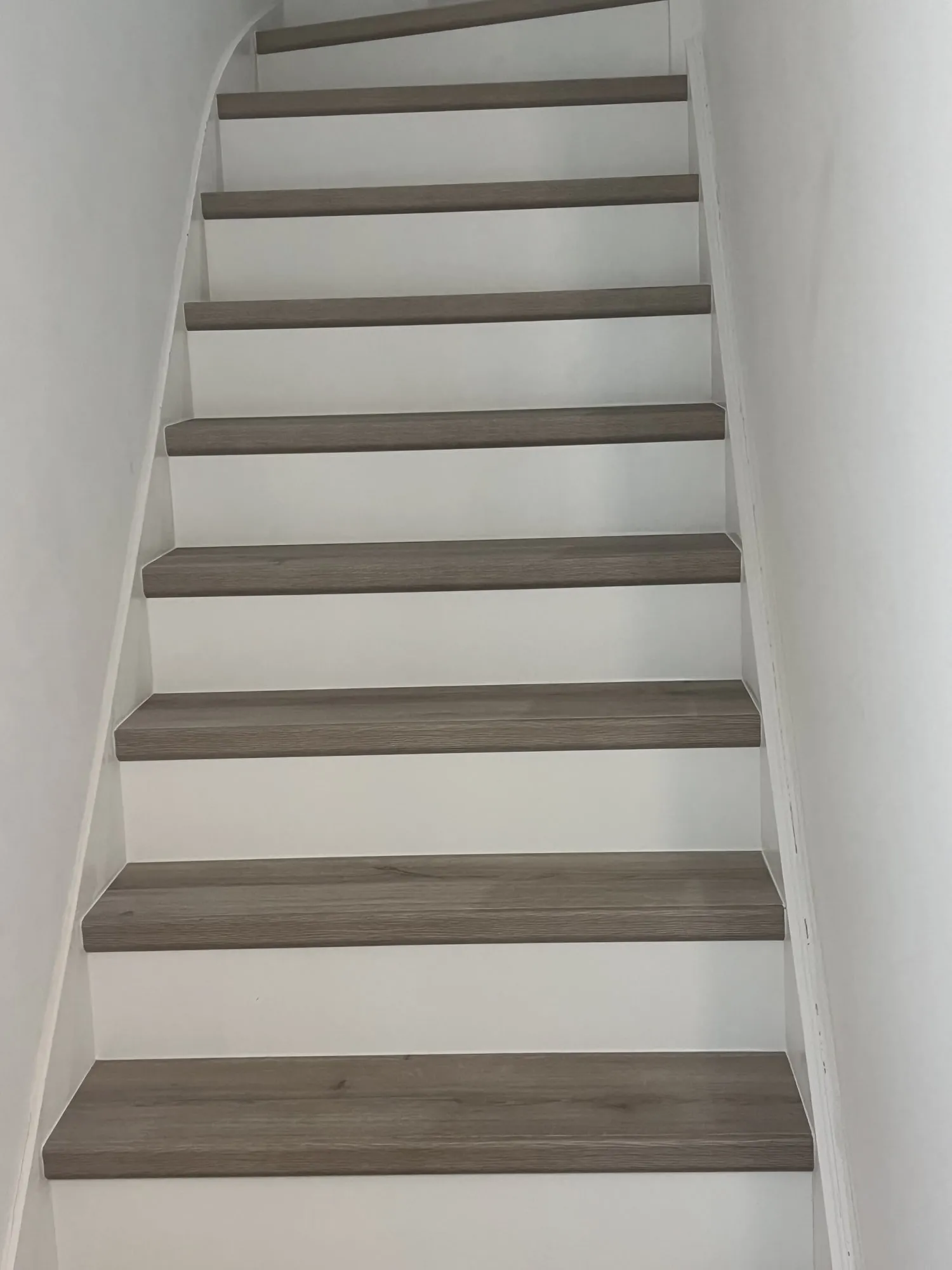 Laminate stairs with custom white risers, Didcot