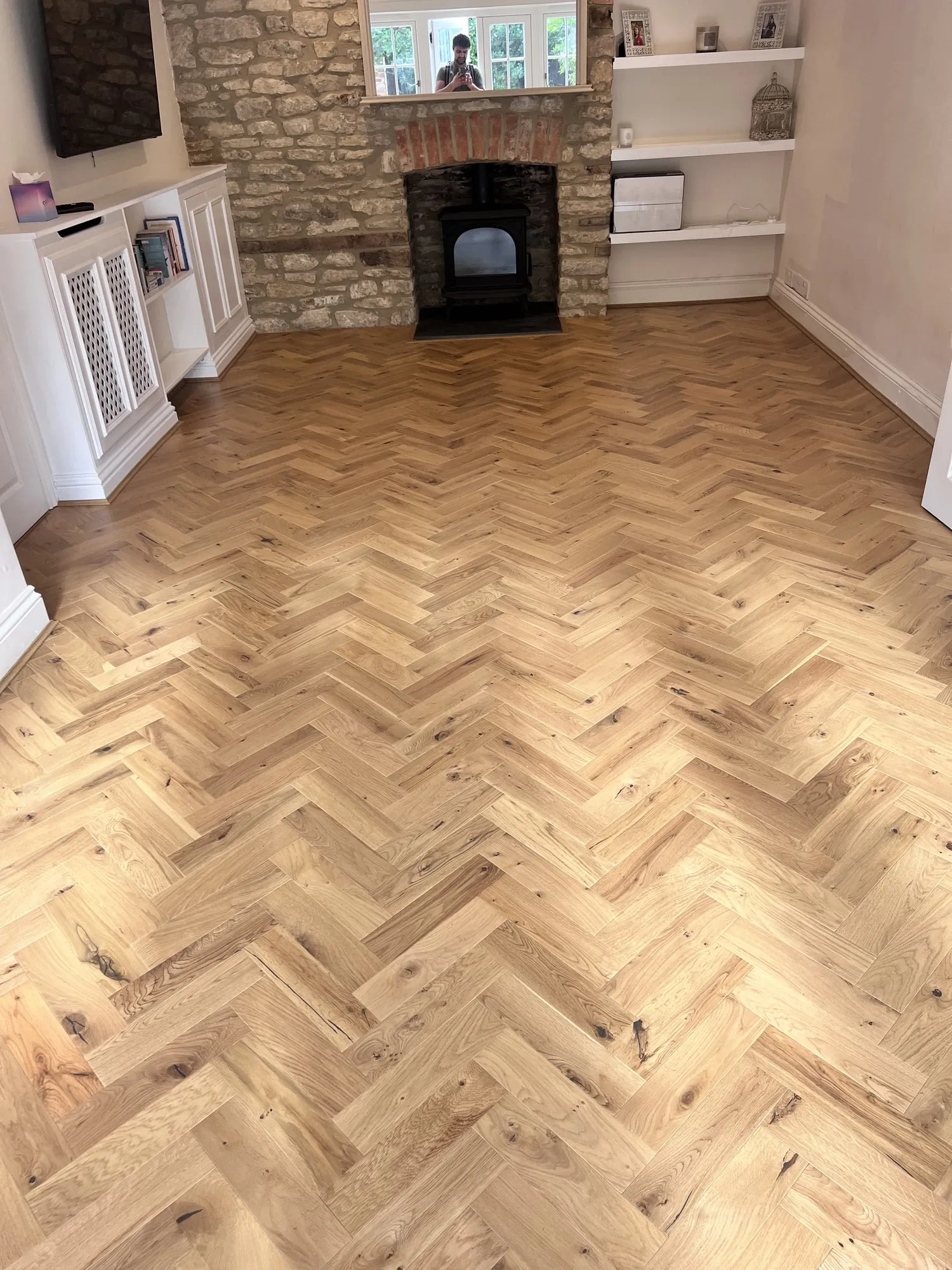 Engineered herringbone parquet, fully stuck down, Oxfordshire
