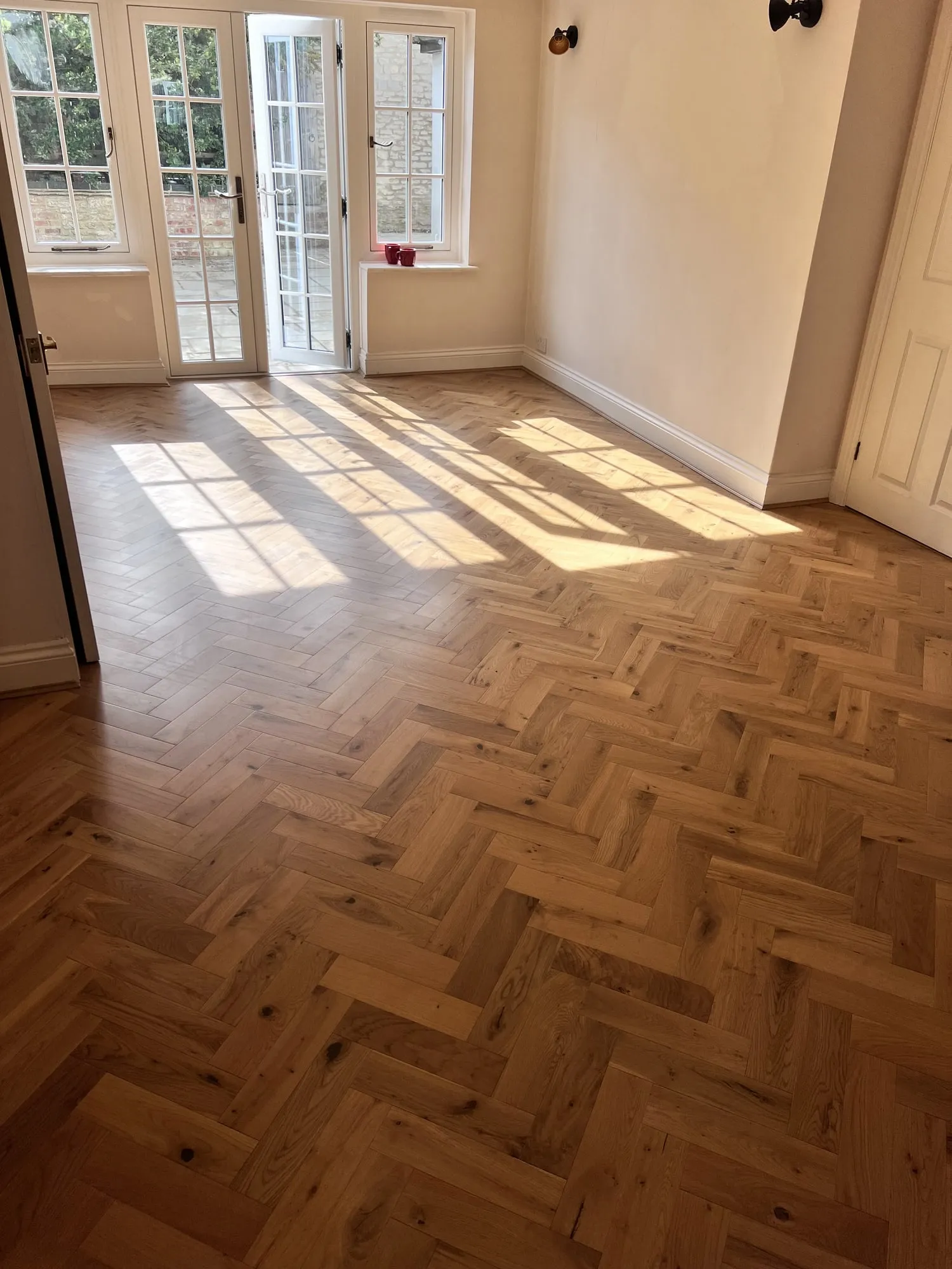 Engineered herringbone parquet fitted by Nicolai