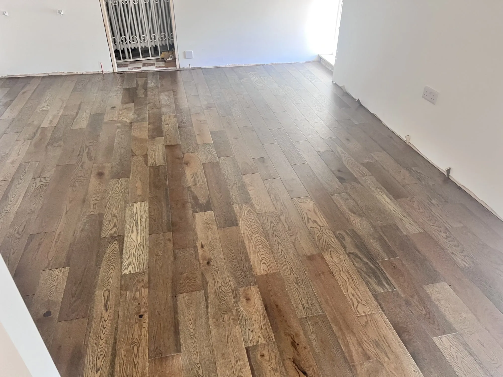 Engineered wood, herringbone & parquet: a job by Nicolai